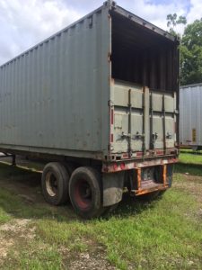 Back view of steel container chip van