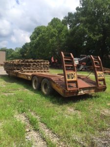 Back view of lowboy trailer