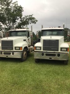 Two Mack trucks